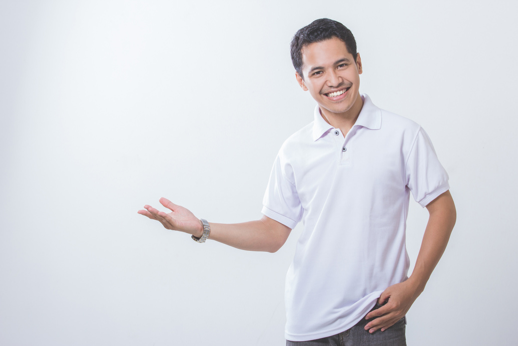 Happy Smiling Young Man Presenting